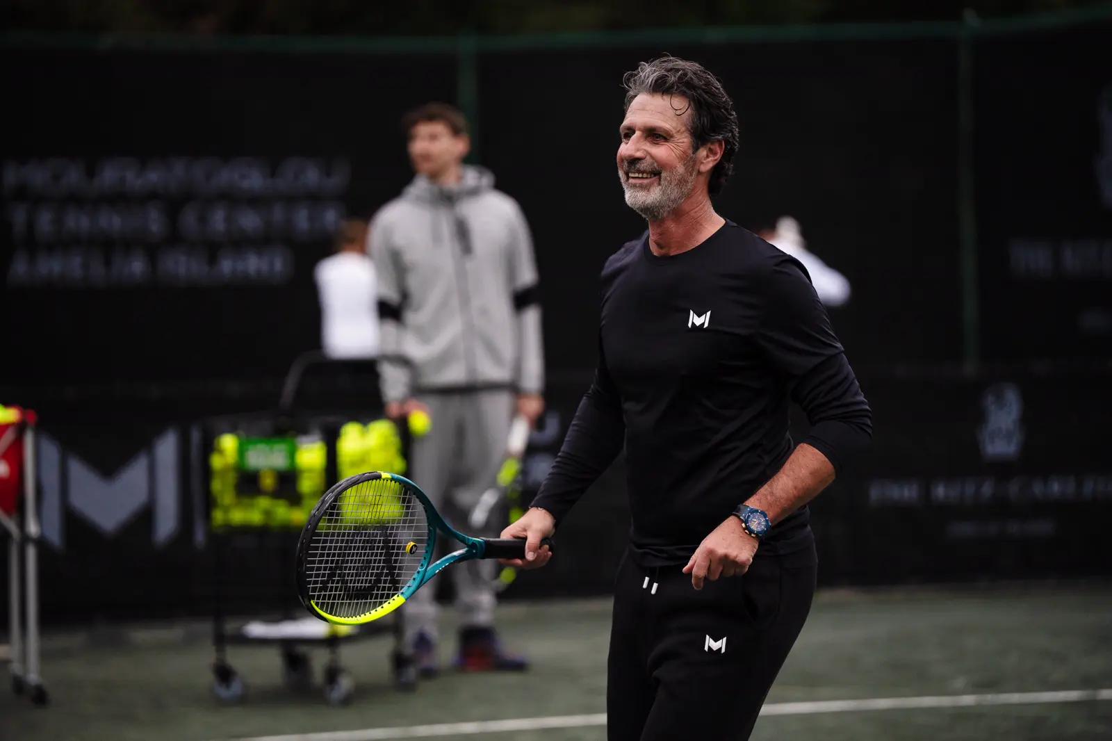 Patrick Mouratoglou gioca a tennis sui campi del Mouratoglou Tennis Center Amelia Island