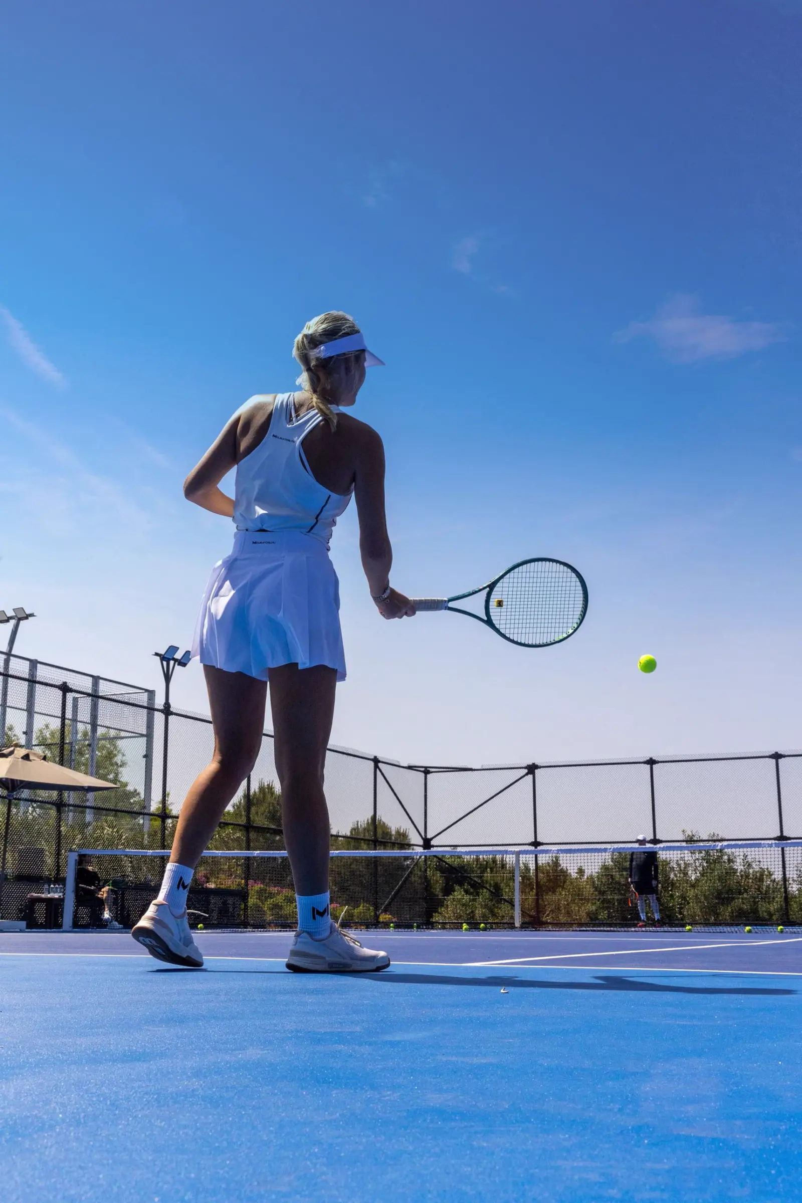 Player preparing a forehand on a sea-view court at Mouratoglou Tennis Center Bodrum