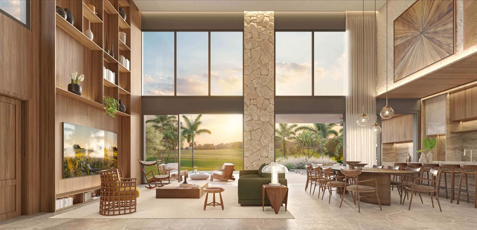 Salón de doble altura de una villa con grandes ventanales a los jardines en Heritage Riviera.