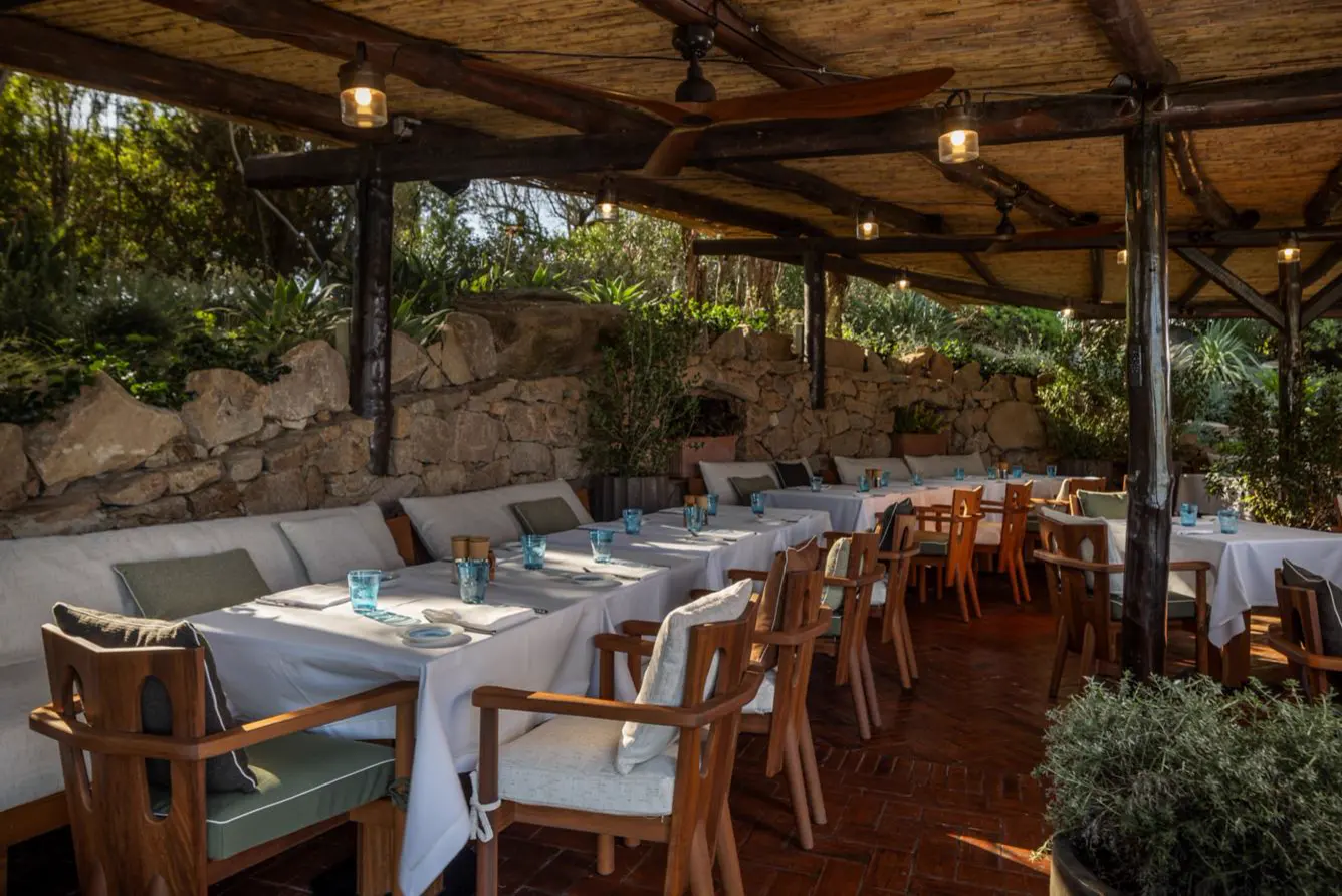 Outdoor restaurant terrace dressed for a private celebration at Hotel Cala di Volpe