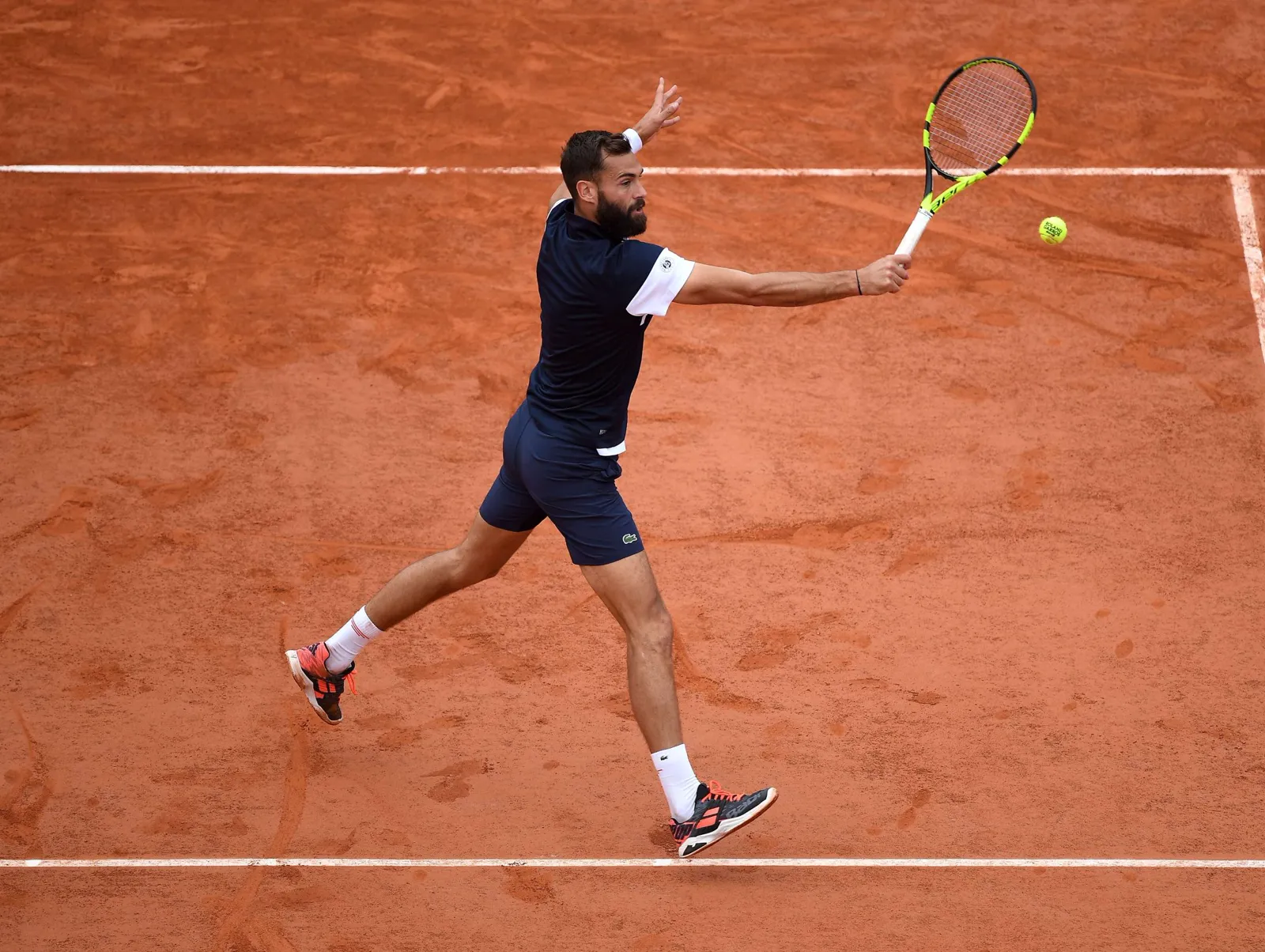 Benoît Paire hitting a forehand on clay