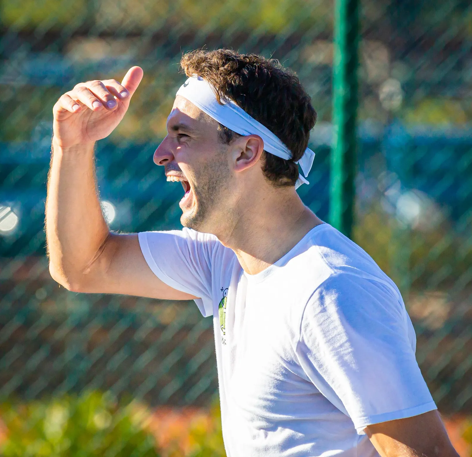 Grigor Dimitrov riéndose durante un entrenamiento