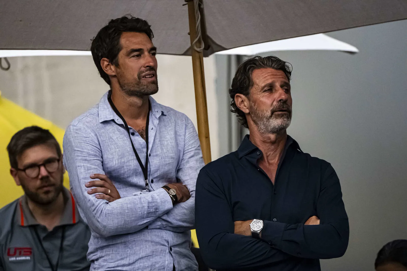 Jérémy Chardy viendo un partido junto a Patrick Mouratoglou