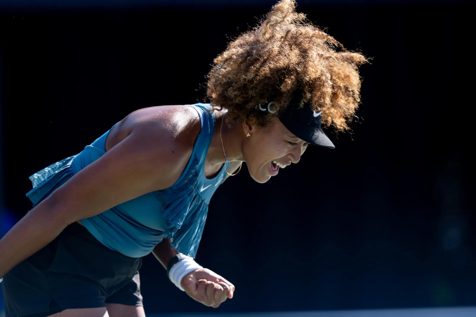 Naomi Osaka celebrating a point